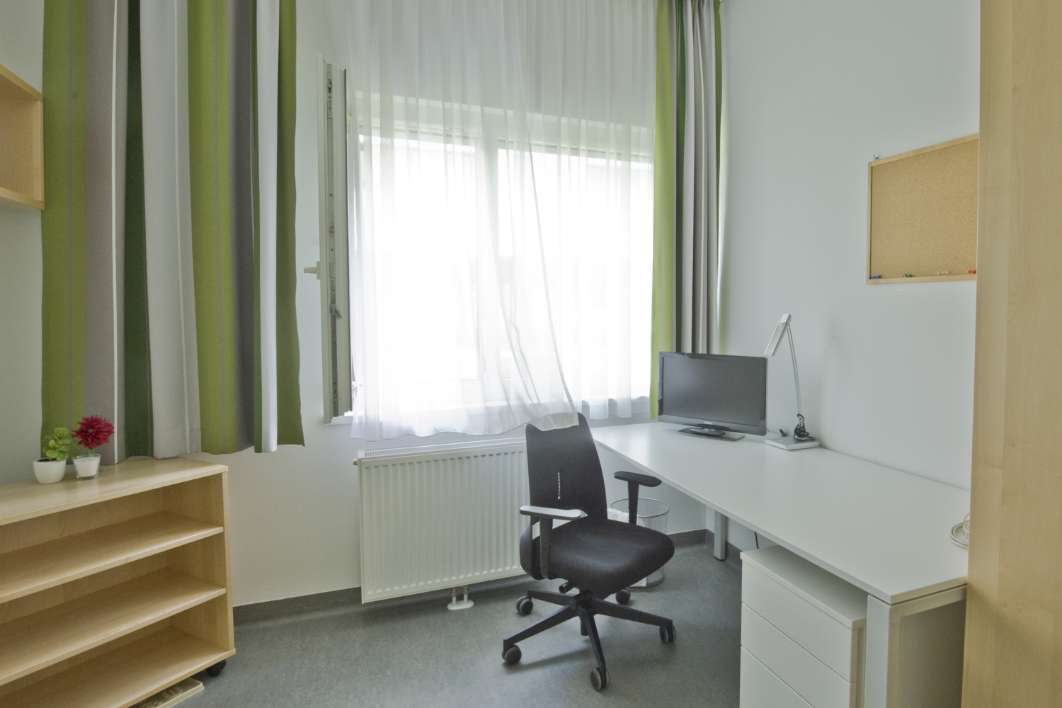 H11_Schlafzimmer STUWO Villach - Ferienapartment